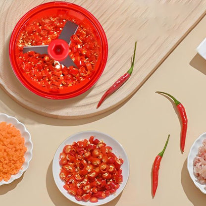 hachoir manuel avec tomates hacher